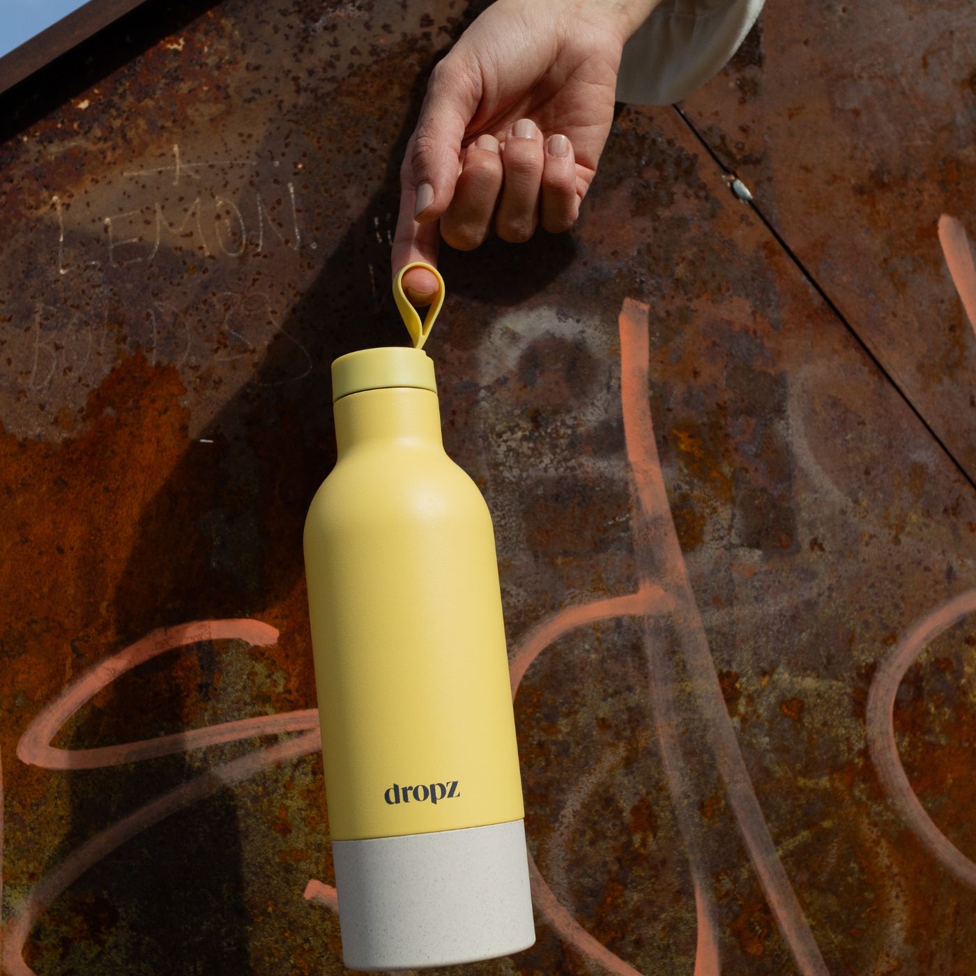 dropz Bottle yellow - 0.5L with storage compartment